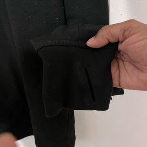 Black and silver Victoria’s Secret sweatshirt and sports tote bag